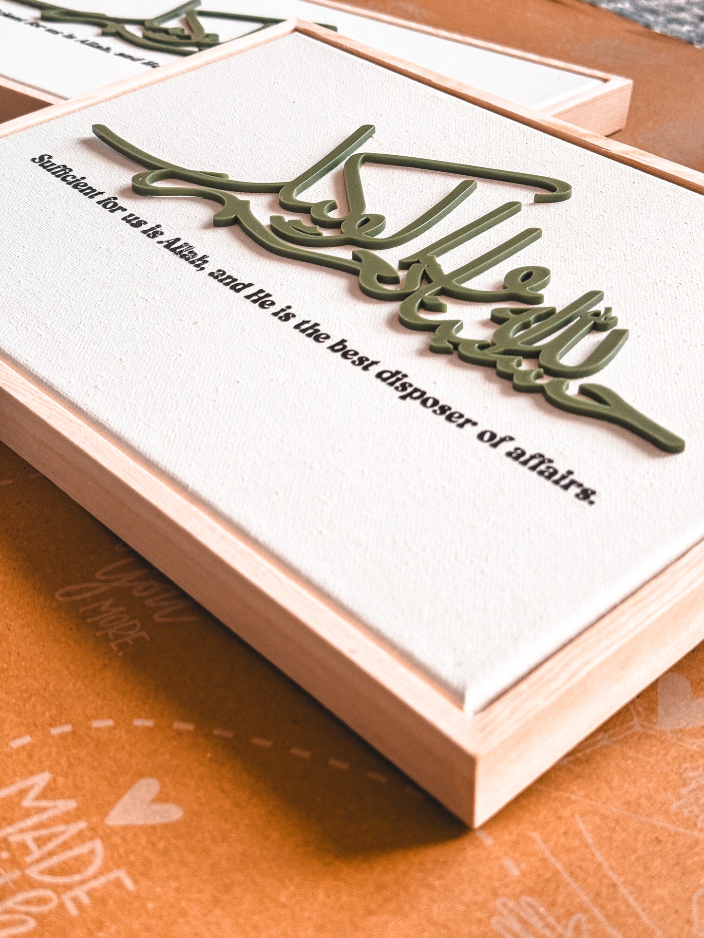 Dua canvas with laser cut lettering